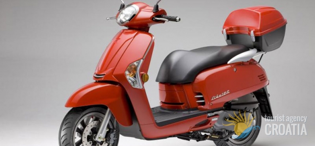 Rent-a-scooter Vespa red Like 50 cc